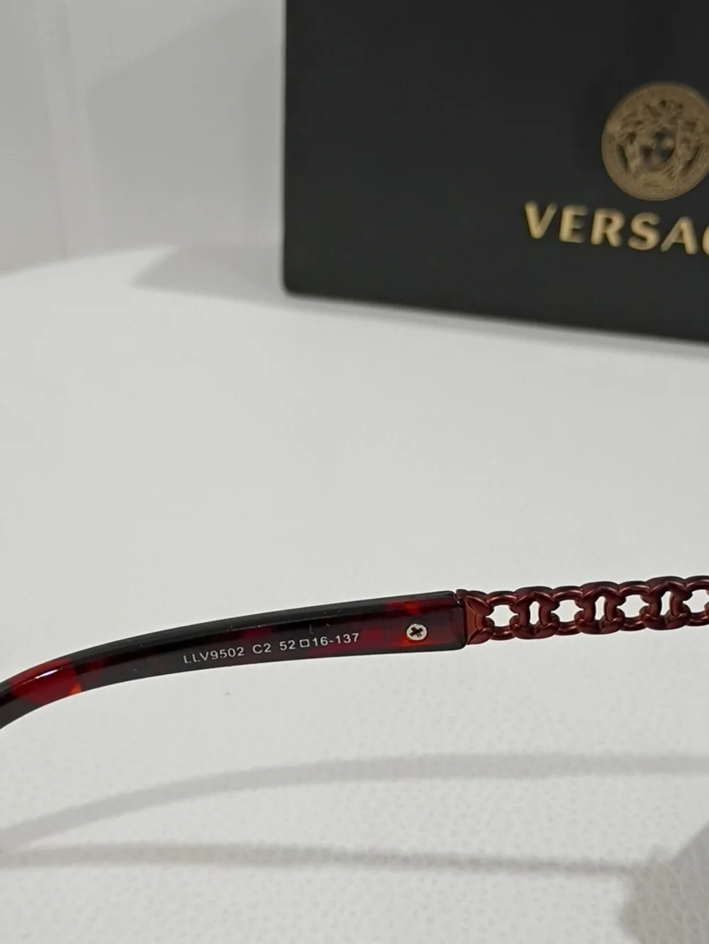 Versace Women's Black and Tortoiseshell Sunglasses with Dark Lenses